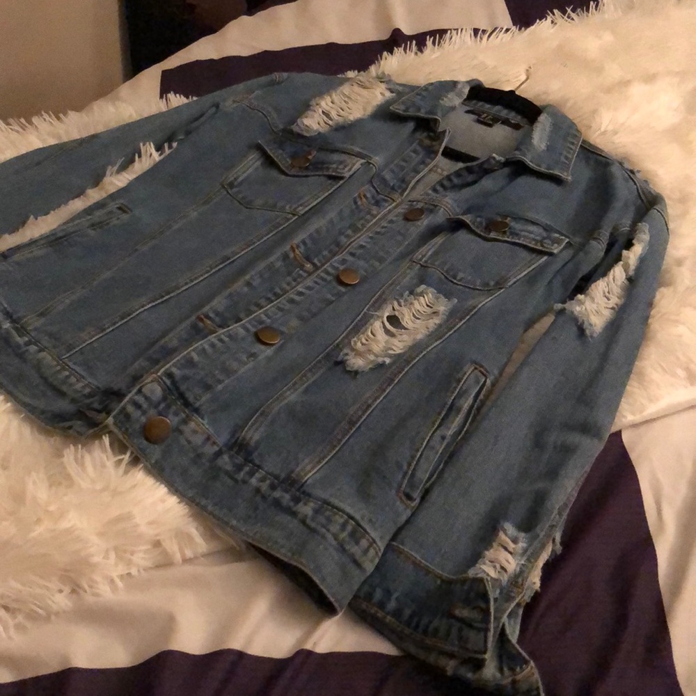 Distressed denim jacket